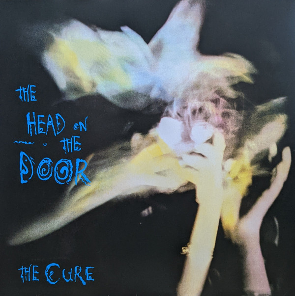 The Cure - The Head On The Door | Fiction Records (R1 60435) - main The Cure - The Head On The Door | Fiction Records (R1 60435) - main