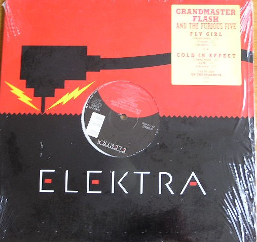 Grandmaster Flash & The Furious Five - Fly Girl / Cold In Effect | Elektra (0-66765)