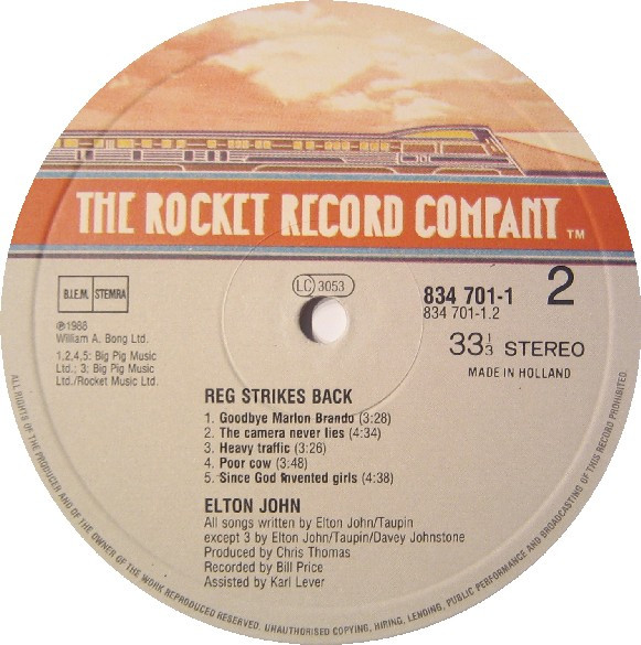 Elton John - Reg Strikes Back | The Rocket Record Company (834 701-1) - 5