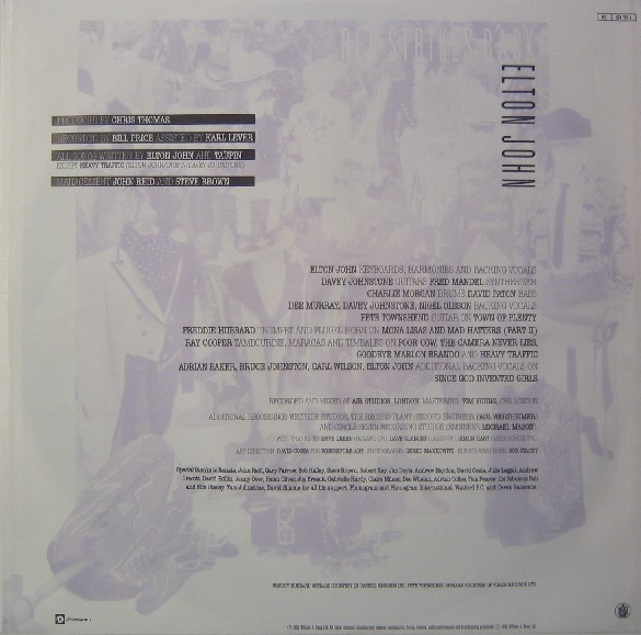 Elton John - Reg Strikes Back | The Rocket Record Company (834 701-1) - 7