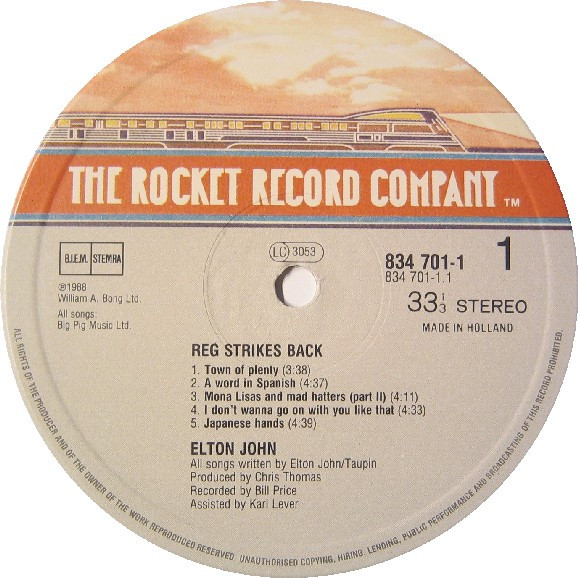 Elton John - Reg Strikes Back | The Rocket Record Company (834 701-1) - 4