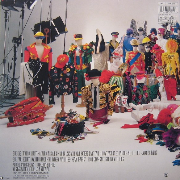 Elton John - Reg Strikes Back | The Rocket Record Company (834 701-1) - 3