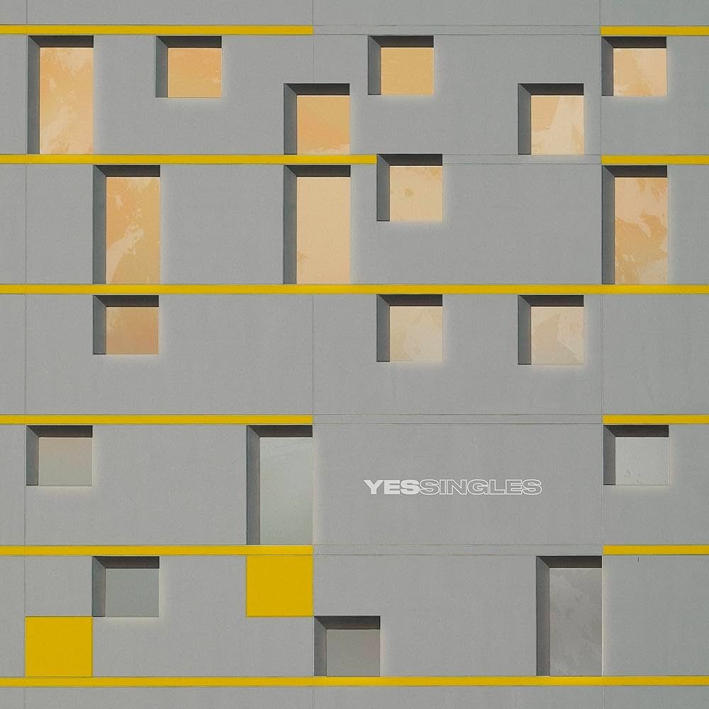 Yes - Yessingles (Yellow Translucent with Orange & Black Splatter Vinyl) [Vinyl] | Rhino Records (RCV1 725181) - main