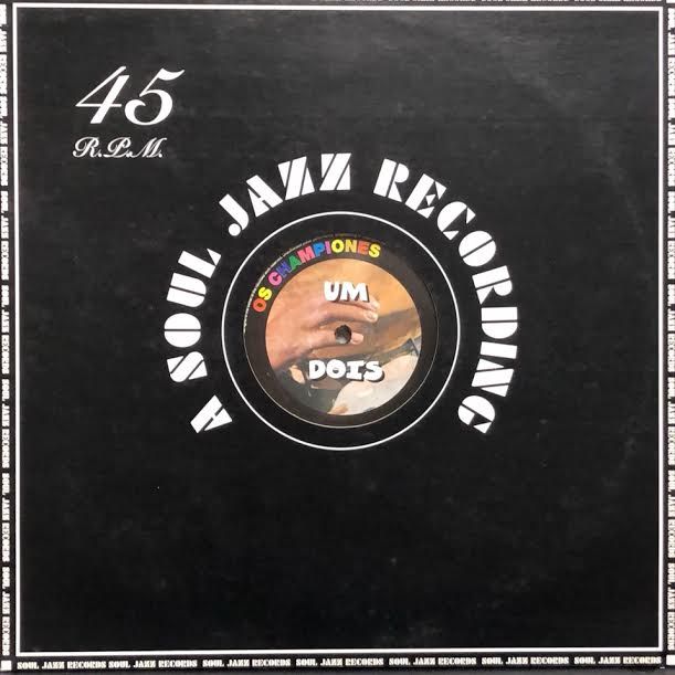 Os Championes - Um Dois Tres | Soul Jazz Records (SJR 025) - main